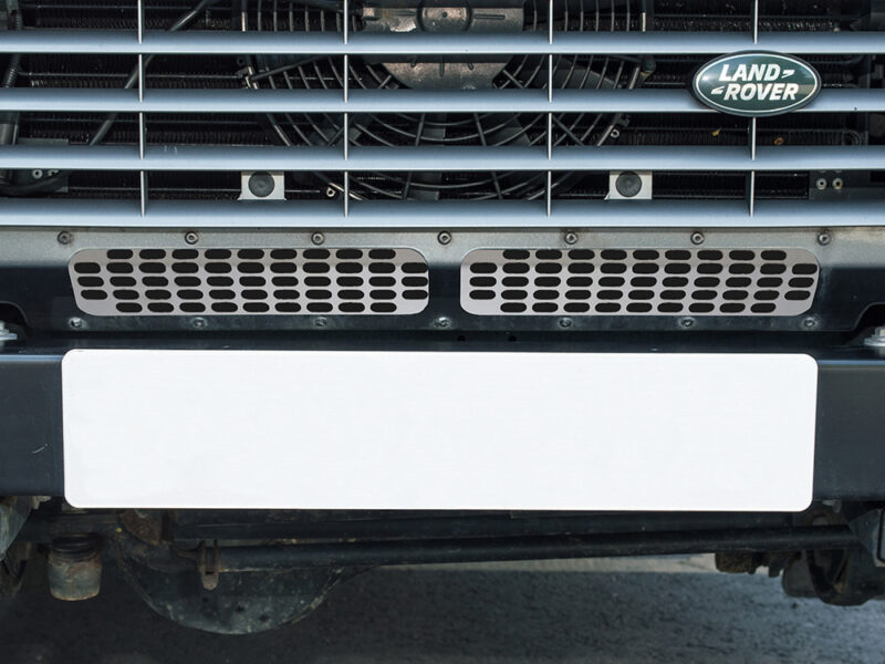 Lower grille defender with air conditioning