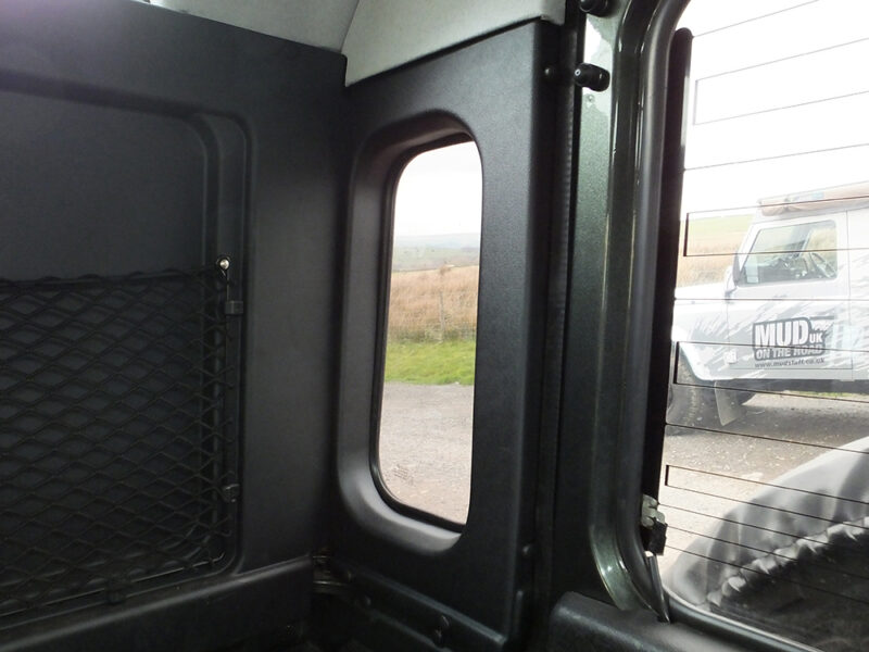 LAND ROVER DEFENDER REAR QUARTER PANEL TRIM WITH WINDOW CUT OUT